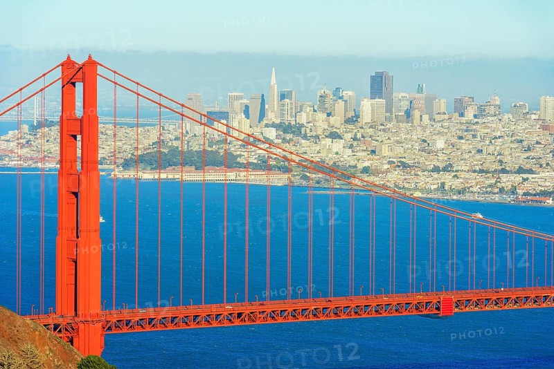 View of Golden Gate Bridge and financial district in the distance, San Francisco, California, USA