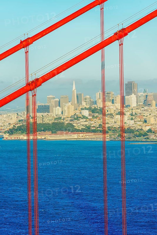 View of Golden Gate Bridge and financial district in the distance, San Francisco, California, USA