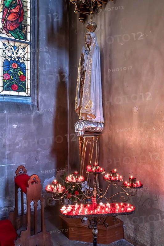 Sacrificial candles with Saint Mary, St. Martin Church, Amberg, Upper Palatinate, Bavaria, Germany