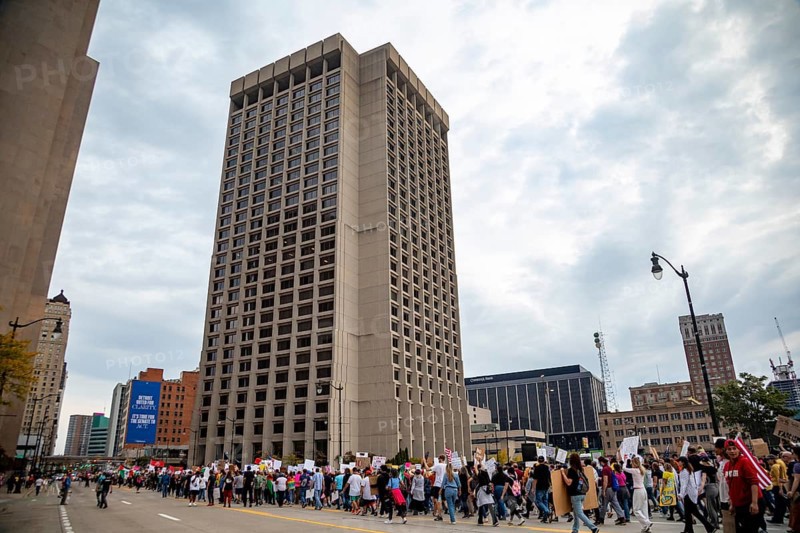 Detroit, Michigan USA - 18 October 2025 - A large crowd marched past the Federal Building during a 'No Kings' rally, protesting President Trump's actions against immigrants and against democratic institutions