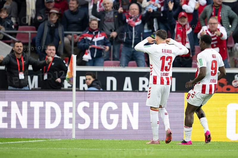 Said el Mala (1.FC Cologne, Midfield, #13), Ragnar Ache (1.FC Cologne, Storm, #9), COLOGNE, Germany - OCTOBER 18: During the Bundesliga match between FC Cologne vs. FC Augsburg at Rheinenergie-Stadion on matchday 8 of the 1st Bundesliga on October 18, 2025 in Cologne, Germany. DFL REGULATIONS PROHIBIT ANY USE OF PHOTOGRAPHS AS IMAGE SEQUENCES AND/OR QUASI-VIDEO, Rheinenergie-Stadion, Cologne, North Rhine-Westphalia, Germany