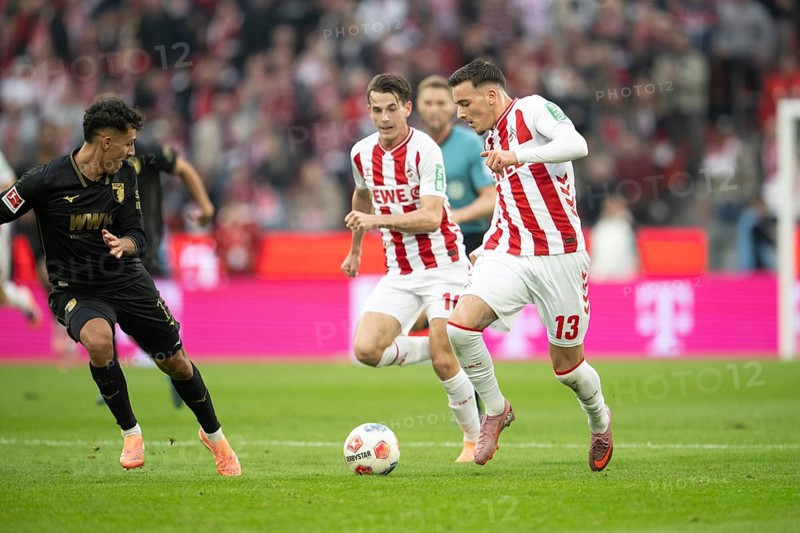Jakub Kaminski (1.FC Cologne, midfield, #16), Said el Mala (1.FC Cologne, midfield, #13), COLOGNE, Germany - OCTOBER 18: during the Bundesliga match between FC Cologne vs. FC Augsburg at Rheinenergie-Stadion on matchday 8 of the 1st Bundesliga on October 18, 2025 in Cologne, Germany. DFL REGULATIONS PROHIBIT ANY USE OF PHOTOGRAPHS AS IMAGE SEQUENCES AND/OR QUASI-VIDEO, Rheinenergie-Stadion, Cologne, North Rhine-Westphalia, Germany