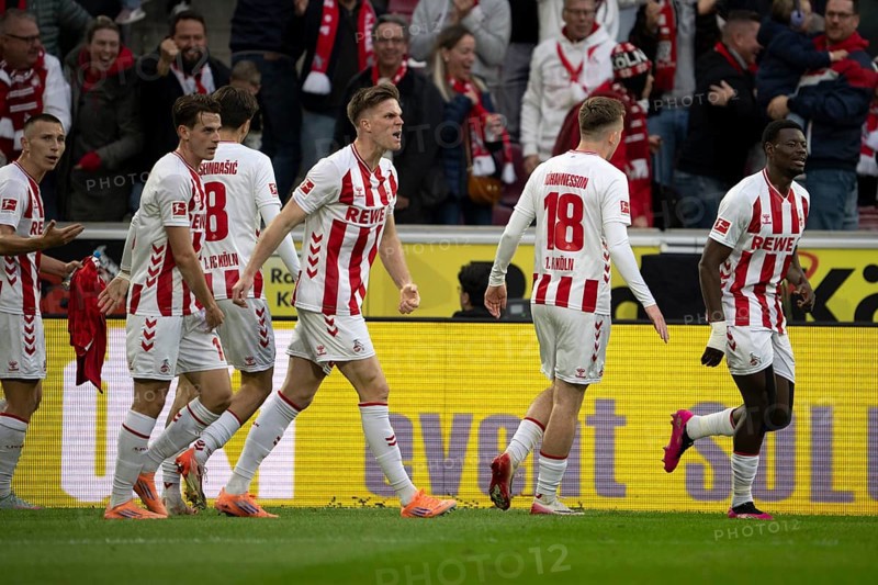 Denis Huseinbasic (1.FC Cologne, Midfield, #8), Isak Joannesson (1.FC Cologne, Midfield, #18), Florian Kainz (1.FC Cologne, Midfield, #11), COLOGNE, Germany - OCTOBER 18: During the Bundesliga match between FC Cologne vs. FC Augsburg at Rheinenergie-Stadion on matchday 8 of the 1st Bundesliga on October 18, 2025 in Cologne, Germany. DFL REGULATIONS PROHIBIT ANY USE OF PHOTOGRAPHS AS IMAGE SEQUENCES AND/OR QUASI-VIDEO, Rheinenergie-Stadion, Cologne, North Rhine-Westphalia, Germany