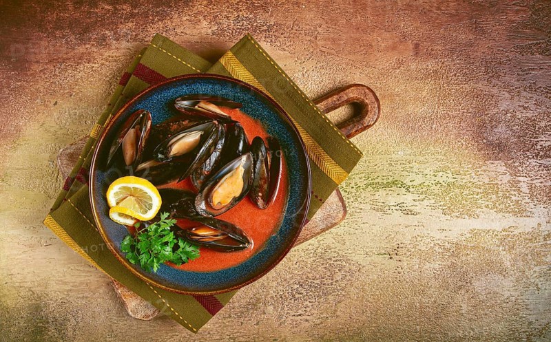 Fra Diavolo mussels, mussels in tomato sauce, Italian dish, on the table, top view, homemade, no people