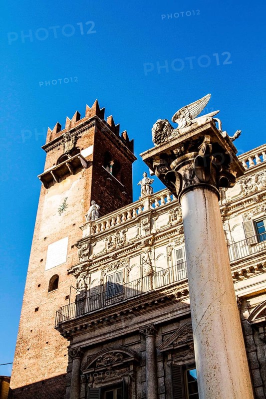 Column with the Lion of Saint Mark and Palazzo Maffei in the backgound at Piazza delle Erbe. Verona, Province of Verona, Italy. 10.12.2012