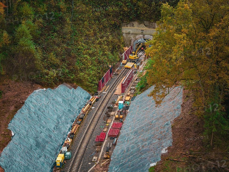 Construction of a tunnel for a railway line in the midst of autumn nature, Herman-Hesse-Bahn construction site, Calw, Germany