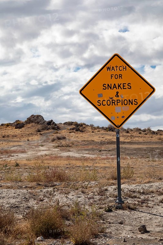 Aragonite, Utah - A sign urges travelers to beware of snakes and scorpions at a rest area along Interstate 80 in the Utah desert