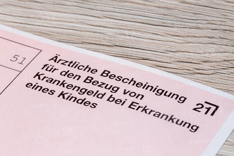 Close-up of a medical certificate for receiving sickness benefit if the child is ill