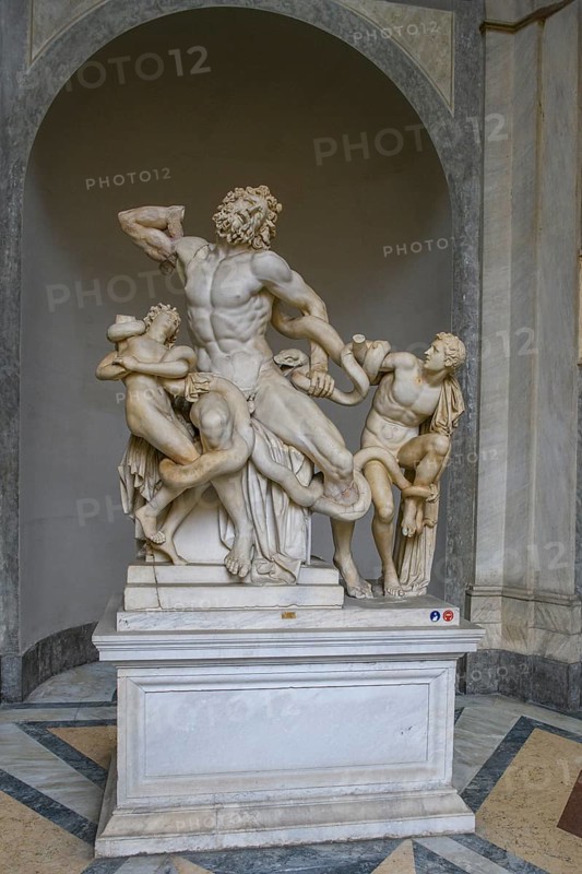 Photo of original ancient marble sculpture Laocoon group of priests Laocoon and his sons fighting with snakes, Museo Pio Clementino, Vatican Museums, Vatican City, Rome, Italy