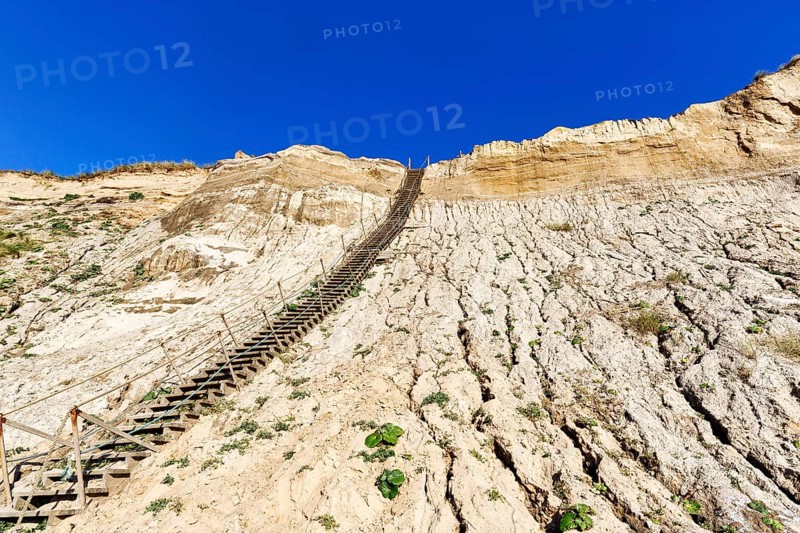 Extremely steep wooden staircase, steep coast down to the natural beach of the North Sea, demolition, erosion, tourist attraction, no. Lyngby, Lökken, Lönstrup, Jutland, Denmark
