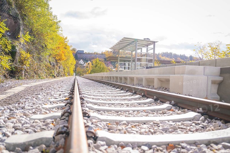 Railway system in autumn with a view of the platform and the surrounding area, ZOB Calw, Hermann Hessebahn, Calw, Germany
