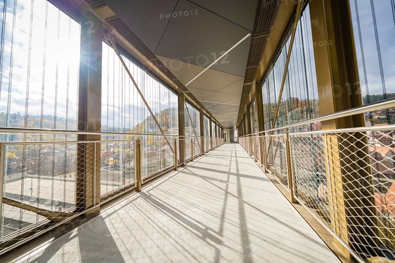Modern footbridge with sun rays and shadows through the grid, ZOB Calw, Hermann Hessebahn, Calw, Germany