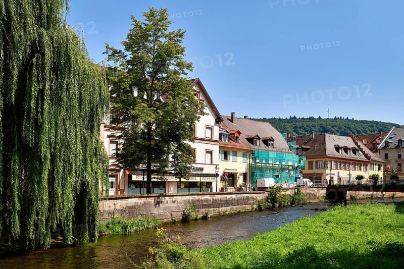 Ettlingen, Germany - August 13th 2025: Alb brook in historic center of Ettlingen, Germany. Small creek with old buildings