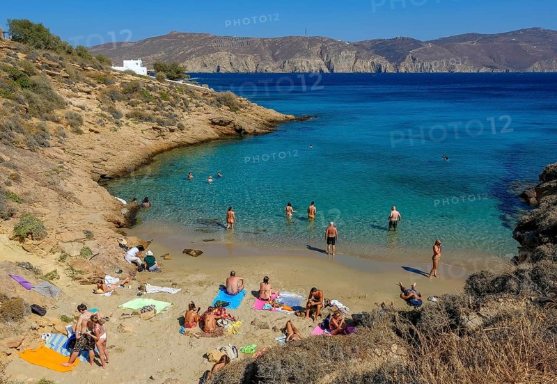 Agios Sostis, Mykonos, Cyclades, Greece - Agios Sostis, small town with the famous restaurant Kikis Tavern, here the small bay LOVERS BEACH directly below the restaurant, sandy beach in the north of the island