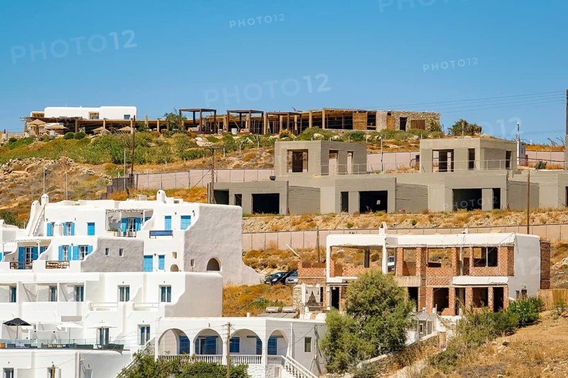 Agios Stefanos, Mykonos, Cyclades, Greece - construction boom, apartment houses in Agios Stefanos, small town with sandy beach, apartments and hotels, north of Mykonos New Port