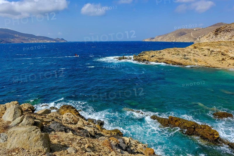 Mykonos, Cyclades, Greece - Ftelia Beach, Ftelia Beach, sandy beach on a windy rocky coast in the north of the island