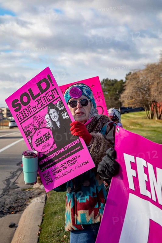Farmington Hills, Michigan USA - 10 November 2025 - Activists picket U.S. Senator Haley Stevens' suburban Detroit office to protest the senator's acceptance of campaign funding from the American Israel Public Affairs Committee (AIPAC). CodePink is a feminist anti-war organization