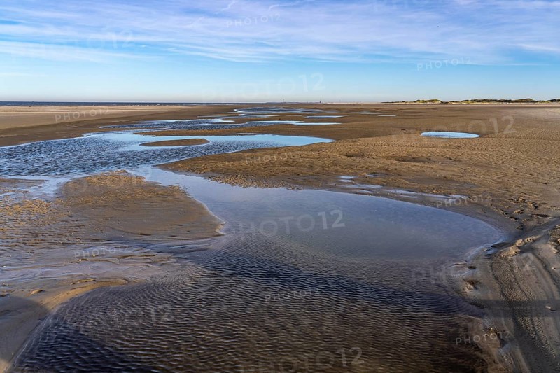 East beach of the East Frisian island of Spiekeroog, at low tide, tidal creek, watercourse at low tide, looking east towards the island of Wangerooge, Lower Saxony, Germany