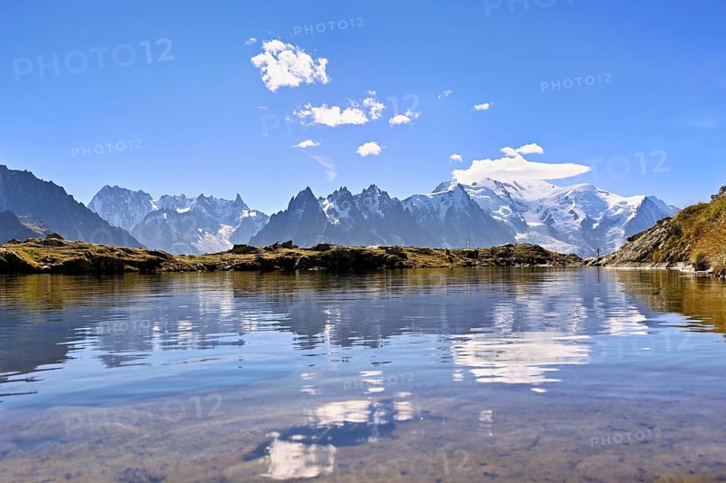 Lac de Chésserys, with the snow-covered Mont Blanc massif in the background, Chamonix-Mont-Blanc, Haute-Savoie, France