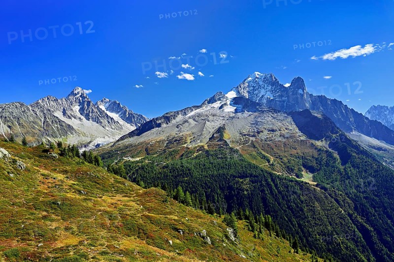 From left Aiguille du Chardonnet, in front foothills of the Argentière Glacier, on the right snow-covered Aiguille Verte, Aiguille du Dru, Chamonix-Mont-Blanc, Haute-Savoie, France