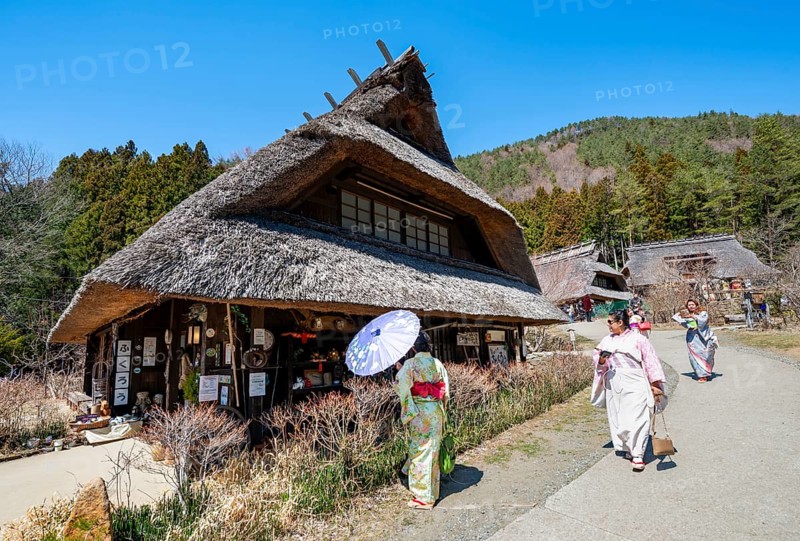 Visitors in kimono, Iyashinosato open-air museum, old Japanese village with traditional houses, Fujikawaguchiko, Saiko, Japan