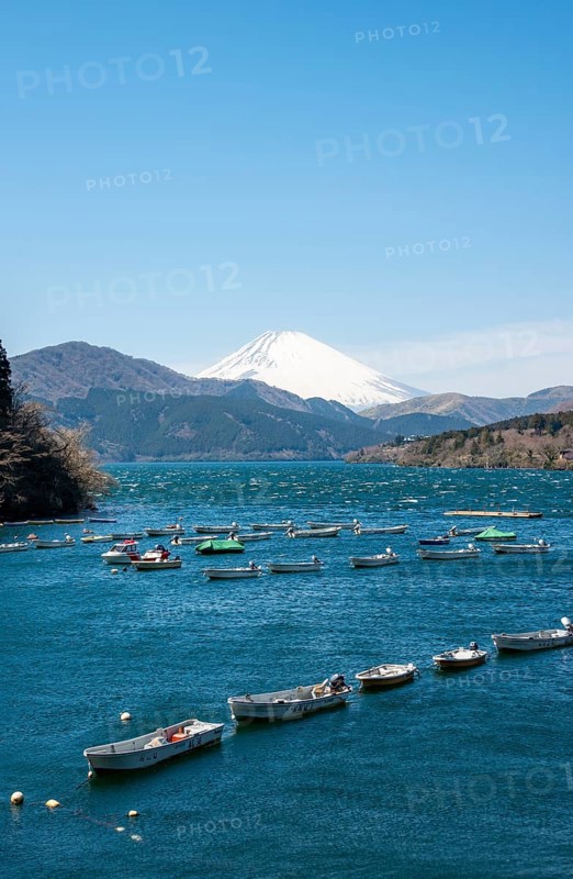 Attached rowing boats, view of Lake Ashi with Mount Fuji volcano, Hakone, Japan