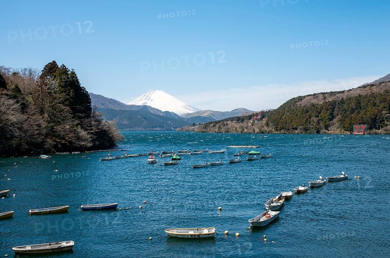 Attached rowing boats, view of Lake Ashi with Mount Fuji volcano, Hakone, Japan