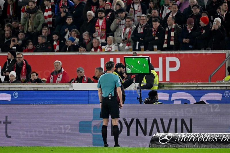 Referee Harm Osmers looks on VAR monitor, video assistant, video evidence, video referee video assistant referee MHPArena, MHP Arena Stuttgart, Baden-Württemberg, Germany