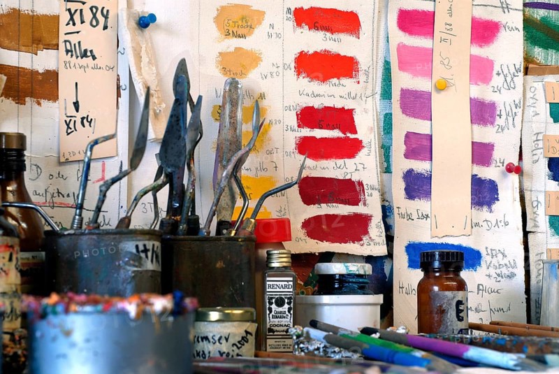 Studio with various color samples and painting supplies, creative atmosphere with strong shades, artist studio, Zurich, Switzerland