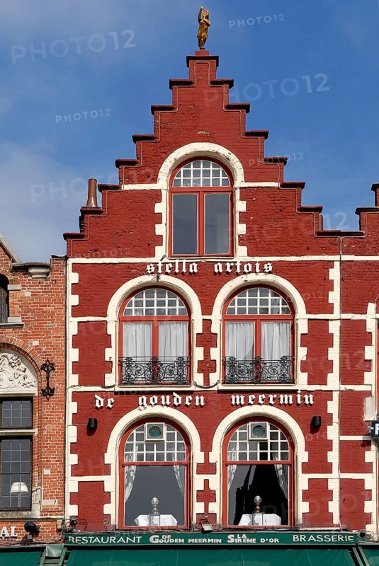 Old brick house painted in red and white, market square, Bruges, UNESCO World Heritage Site, West Flanders, Flemish Region, Belgium
