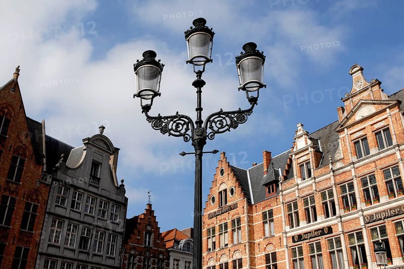 Street lamp in front of historic building view, Market Square, Bruges, UNESCO World Heritage Site, West Flanders, Flemish Region, Belgium