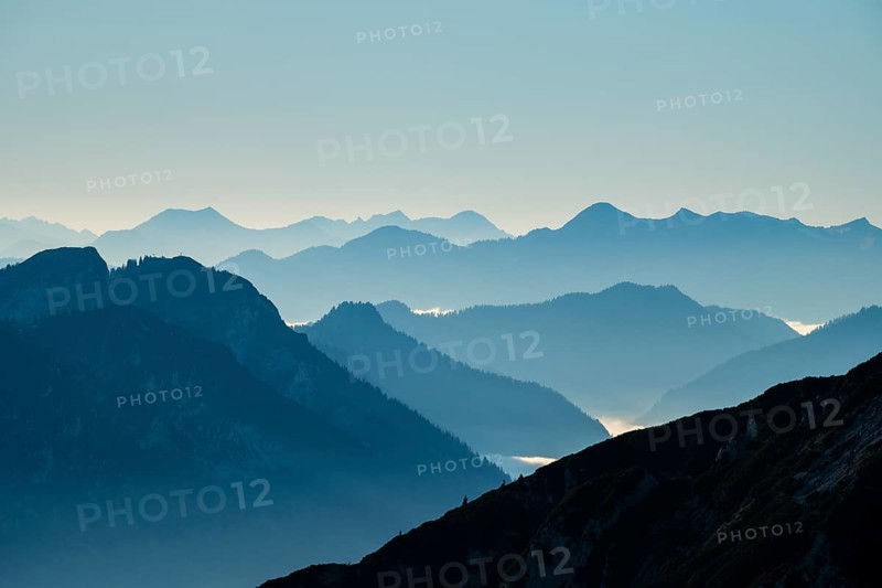 Blue-colored silhouette of mountains, Chiemgau Alps, Upper Bavaria, Bavaria, Germany