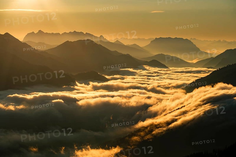 Silhouette of mountains at dusk, fog in the valley, Wilder Kaiser and Chiemgau Alps, Upper Bavaria, Bavaria, Germany