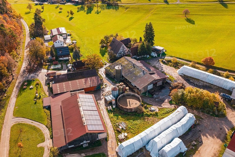 Aerial view of a farm with buildings and agricultural land in autumn surroundings, Haselstaller Hof, Gechingen, Germany