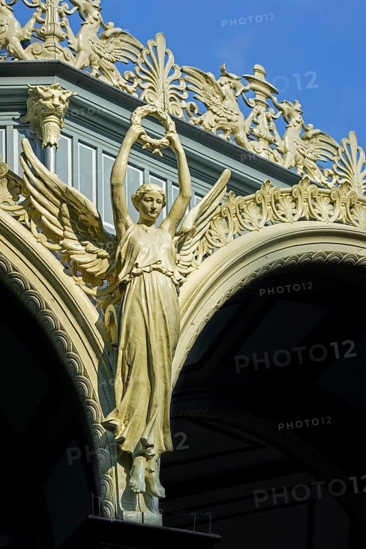 Nike goddess of victory, griffins and palmettes decorating 1885 Kiosk, music pavillion at the Citadel park in the city Ghent, East Flanders, Belgium