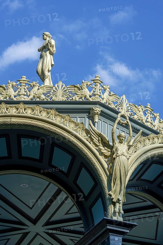 Greek Muze Erato, goddess Nike, griffins and palmettes decorating 1885 Kiosk, music pavillion at the Citadel park, city Ghent, East Flanders, Belgium