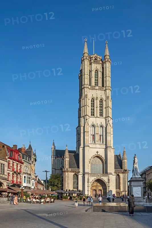 Saint-Bavo's square showing St. Bavo's cathedral, Sint-Baafskathedraal and pavement cafés in the city Ghent in summer, East Flanders, Belgium