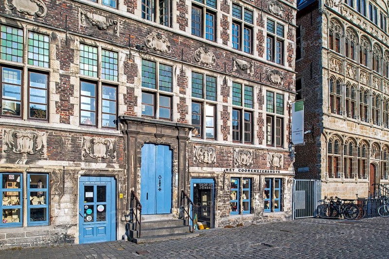 Façade of 17th century baroque guildhall Korenmetershuis at the Graslei in the city Ghent, East Flanders, Belgium