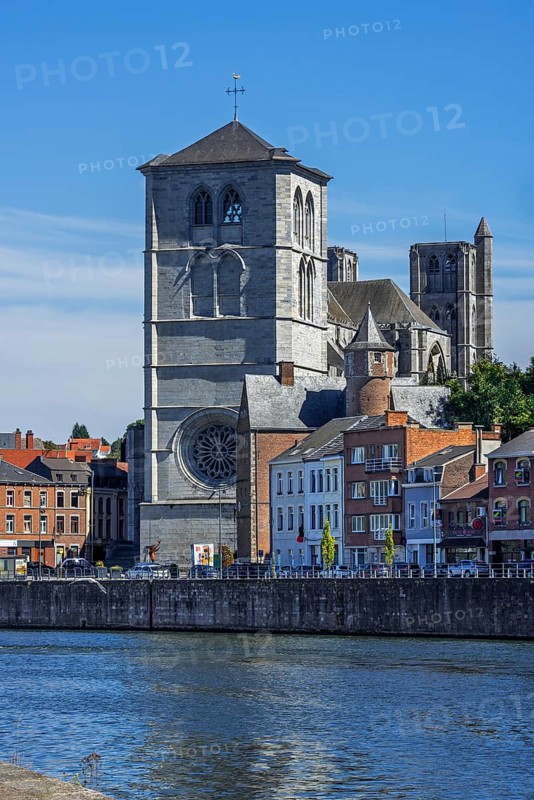16th century Gothic Notre-Dame collegiate church along the Meuse river in the city Huy, province of Liège, Belgium