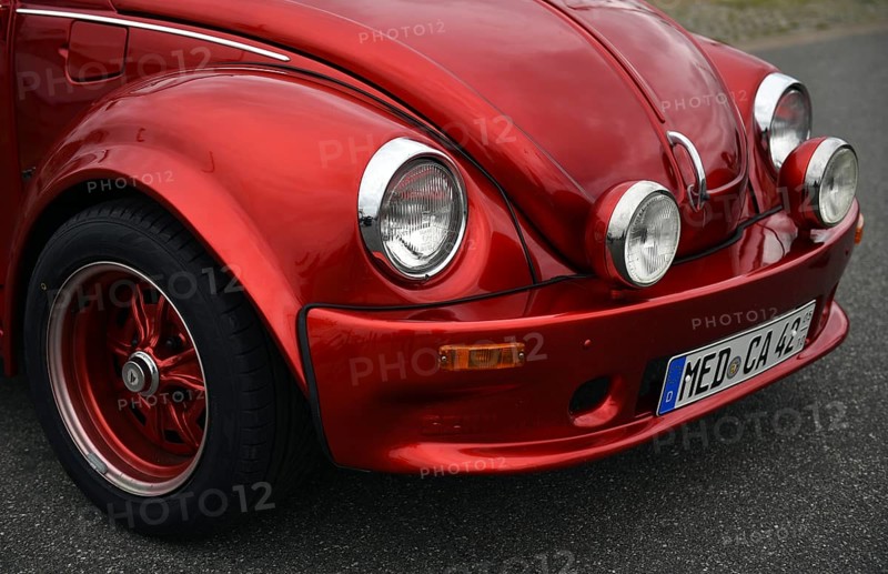 Red VW Beetle at classic car meeting in Büsum, Schleswig-Holstein, Germany