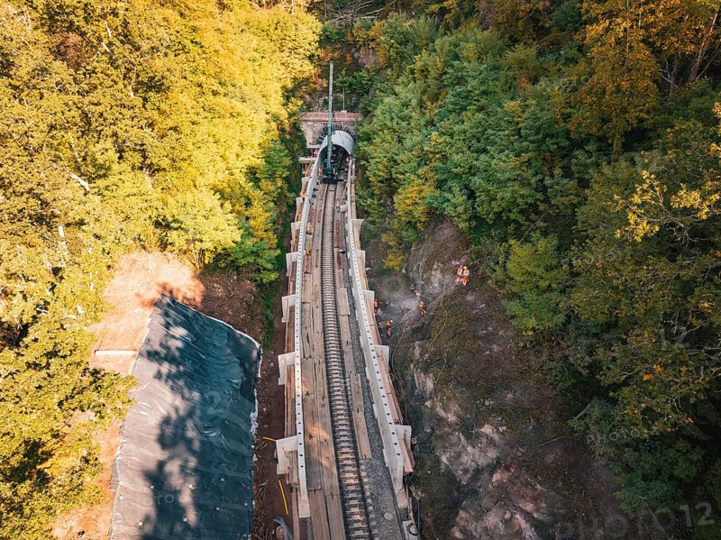 Rail construction site in the forest taken from the air with tunnel boring machine, construction of Hermann, Hesse, Bahn, Calw, Germany