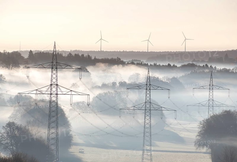 Morning atmosphere with foggy landscape and power poles in the foreground, Swabian Jura, Baden-Württemberg, Germany
