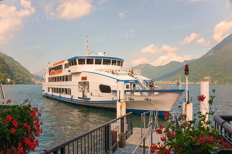 Sightseeing boat on Lake Como, Italian Lago di Como, one of the Upper Italian lakes, Lombardy region, Italy