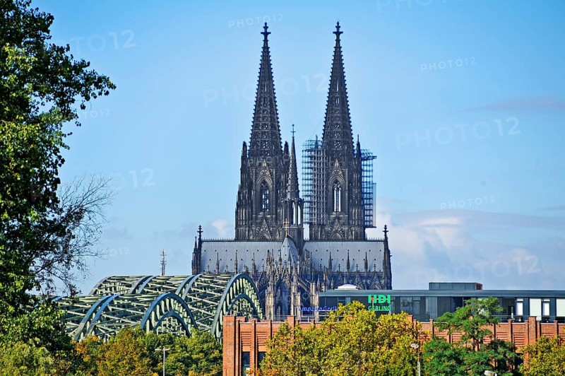 View of Cologne Cathedral seen from the exhibition hall, on the left the railroad bridges across the Rhine, Cologne, North Rhine-Westphalia, Germany