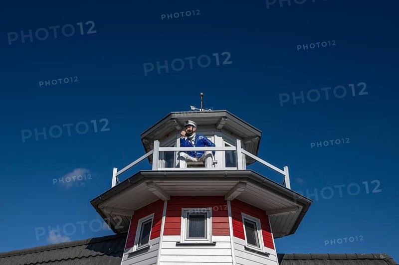Captain figure on the balcony of a holiday home, Zingst, Darß, Mecklenburg-Western Pomerania, Germany