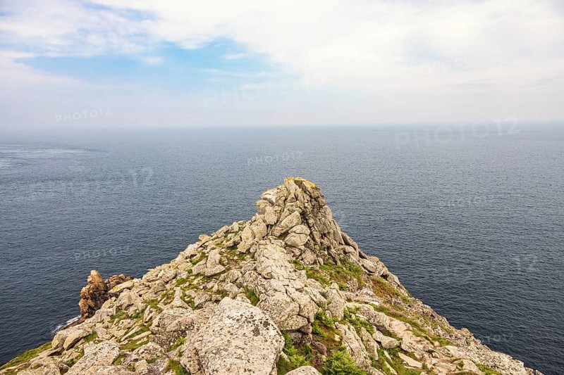 Seascape view to the horizon from a rocky peninsula at the coast, Crozon peninsula, Bretagne, France