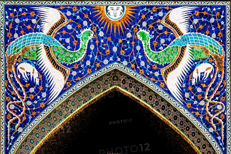 Nadir Devon Begi madrasah with fabulous birds at the entrance portal, Bukhara - the Holy City, Uzbekistan