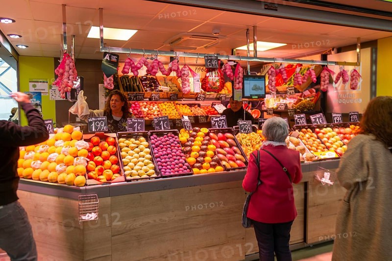 Market stall shop store selling fruit and vegetables inside Mercado Central de Zaragoza, Zaragoza, Aragon, Spain