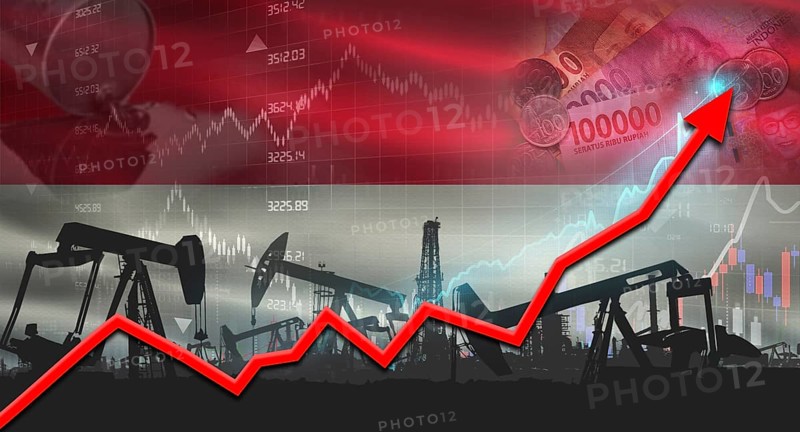 Growth of oil industry with Indonesian flag. Oil pumps with Indonesian flag. Oil production with Indonesia flag