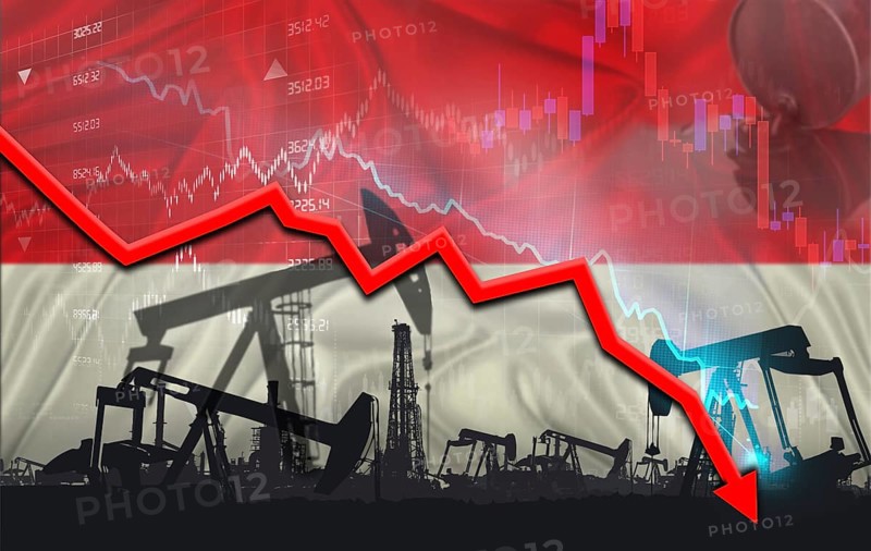Crude crisis with Indonesian flag on financial graph. Fall oil price with flag of Indonesia on economic chart